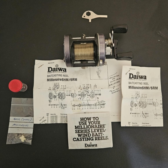 DAIWA Millionaire 6HM/6RM Fishing Baitcasting Reel with Spare Parts and Key - Picture 1 of 7